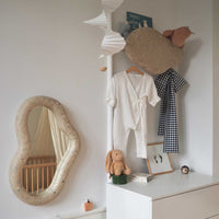 Children's room with ecoBirdy Marine Mirror Faded-White, Marine Coat Rack Faded-White and Charlie Chair in strawberry colour way