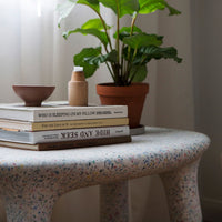 Luisa Table Party also serves as a coffee table in the living room