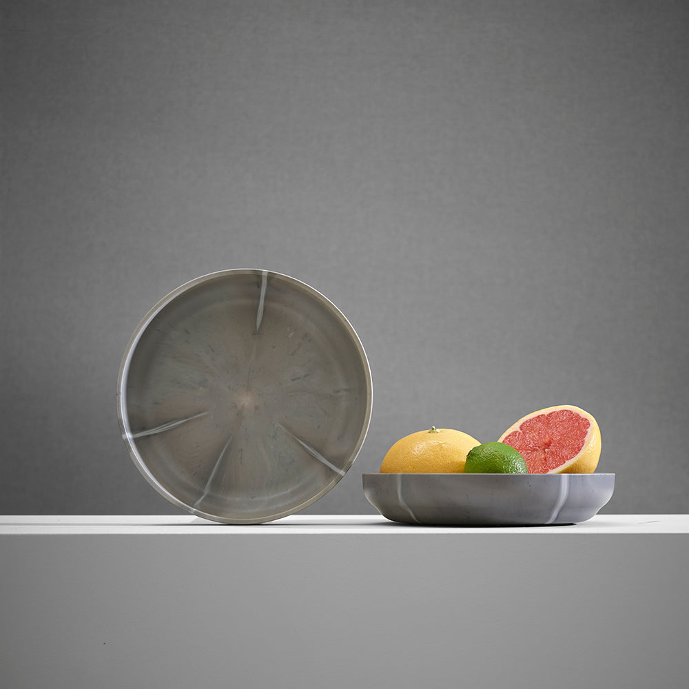ecoBirdy Mabo Plate in the colour Sesame. It is bowl shaped and has a pattern like marble.
