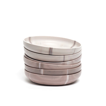 ecoBirdy Mabo Plate Sumac is a set of six plates in a gradient from pink to grey.