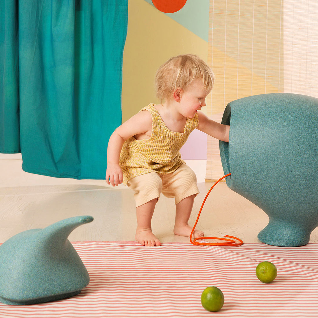 Kid storing away his toys in Kiwi Container Paua - ecoBirdy